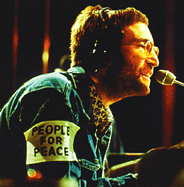 image of John Lennon with armband that says 'People for Peace'.